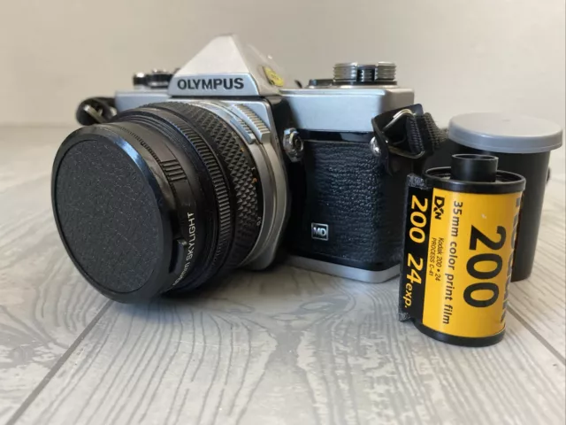 Vintage Olympus OM-1 film camera with 50mm 1.4 lens 1970s