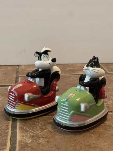 Warner Brothers Pepe Le Pew & Penelope Bumper Cars Salt And Pepper Shakers