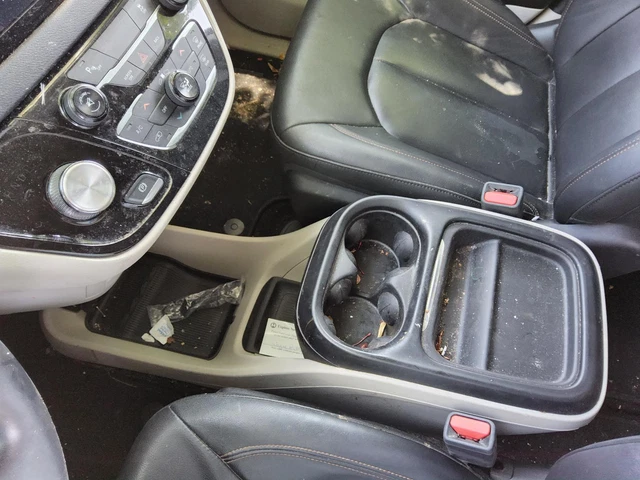 Used Front Lower Center Console fits  2017 Chrysler Pacifica floor w o retractab