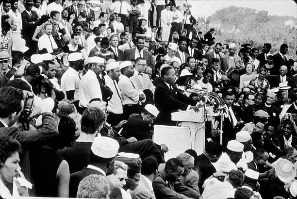 MARTIN LUTHER KING Jr Speaks From Behind A Podium To A Crowd Duri - Old ...
