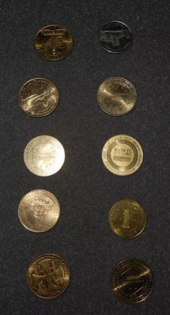 10 pieces jetons touristique   monnaie de paris dans leur pochette à voir