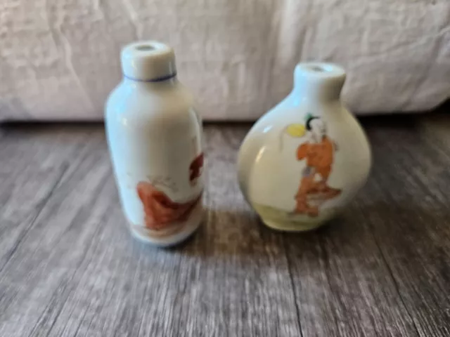 Chinese Pair of Enamel on Porcelain Snuff Bottles