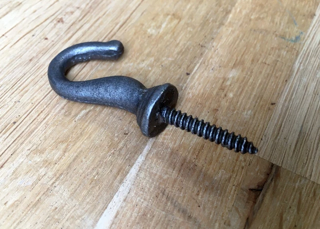 A small vintage style cast iron screw in hook dresser coat hanger SH1