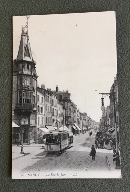 CPA. NANCY. 54 - La Rue St Jean. 1914. Tramway. Restaurant. Couturier Mohler.