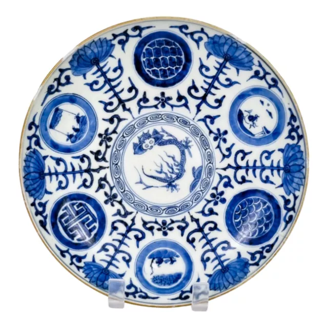 Antique Japanese Edo blue and white porcelain charger with dragon, lotus flowers