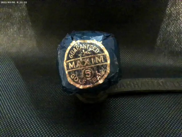 antique vintage MAXIM wrapped mesh golf ball