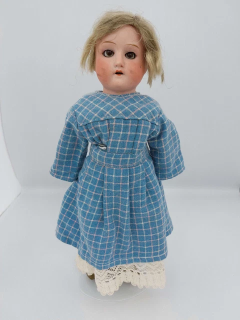Antique Porcelain headed German Mabel doll with jointed leather limbs