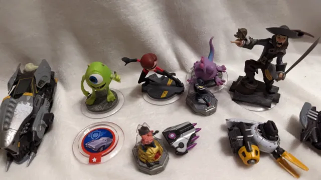 Disney Infinity Figuren - Cars Münze - Monster AG - die Unglaublichen + weitere 3