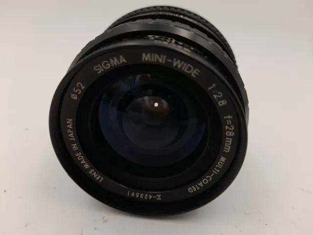 (2312) Objektiv Sigma Mini Wide 2.8/28mm - Multi-Coated- Canon FD - Zustand: gut
