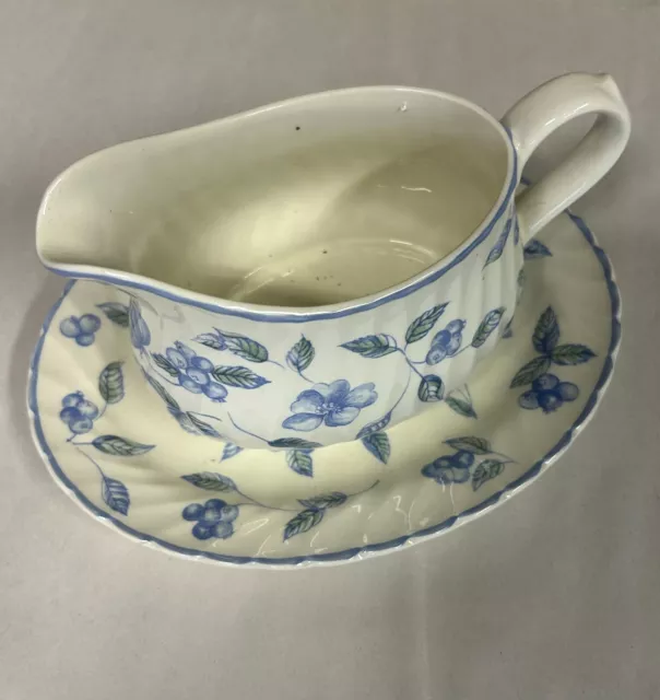 Pretty blue and white Bristol Blue gravy/sauce boat with saucer