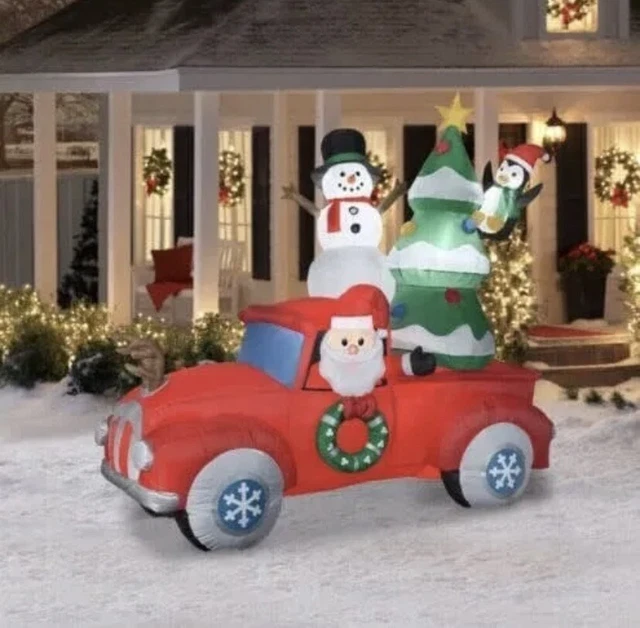 8 FT. GEMMY AIRBLOWN INFLATABLE SANTA IN RED VINTAGE TRUCK. TREE