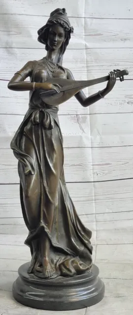 Artful Harmony: Handmade Bronze Sculpture by Jean Representing a Female
