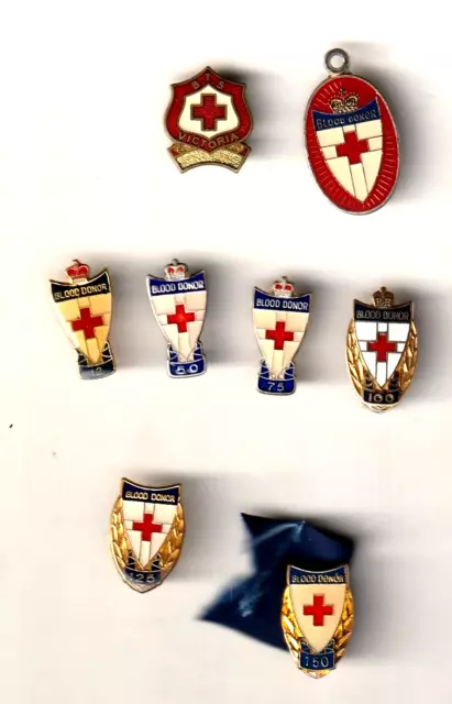 RED CROSS BLOOD DONOR BADGES. SUPERB SET OF EIGHT INC. THE RARE 9ct GOLD BADGE.