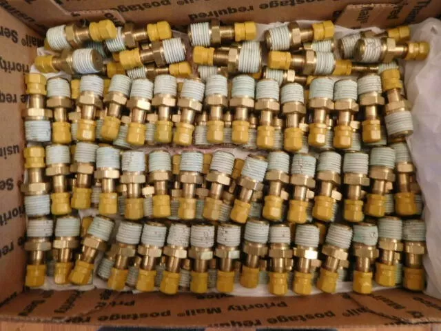 100 - Parker Tank Valve 1/4" NPT ( Gold in color ) Brass Schrader Valve