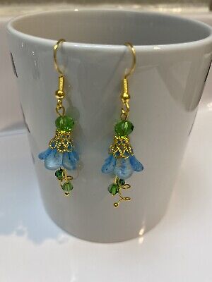 Handpainted Blue Lucite flower earrings with Green Beads On Gold Findings