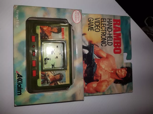 Rambo Hand Held Electronic Video Game Super Rare Condition Mint Condition