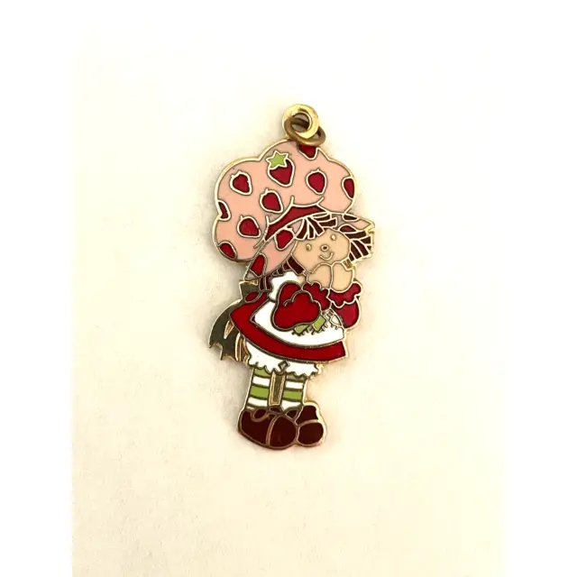 https://www.picclickimg.com/C0AAAOSwUXhlwUPf/Vintage-1980-Strawberry-Shortcake-Enamel-Charm-Pendant.webp
