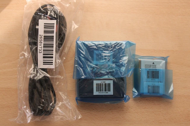 Nuevo en bolsa original genuino Canon LP-E8 batería LC-E8E cargador y cable de alimentación 700D