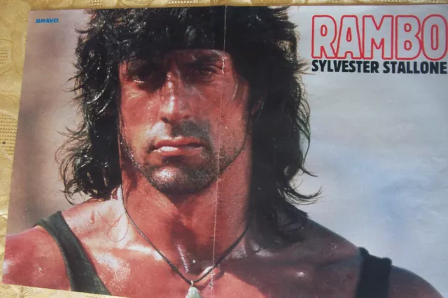 Sylvester Stallone , AC/DC ,  poster 42x29 cms , bravo , comme neuf .