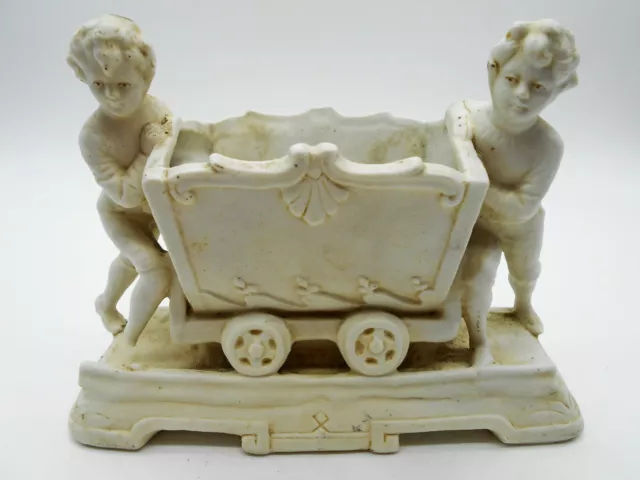Ravissante Figurine / Jardinière  Jeune Garçon Au Chariot En Biscuit Allemagne