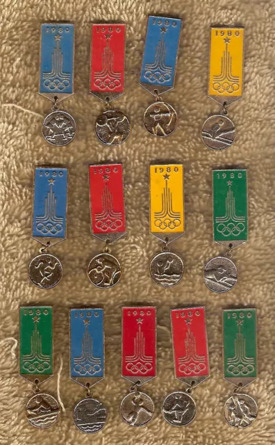 #D490.  Thirteen(13) 1980 Moscow Olympic Event Badges