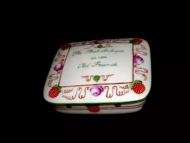 The Best Antique is an Old Friend Porcelain Covered box USA Raised Relief red &