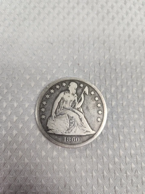 1860-O Seated Liberty Silver Dollar