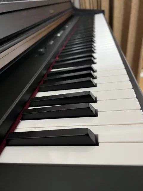 ROLAND HP103E DIGITAL Piano in fantastic condition with matching