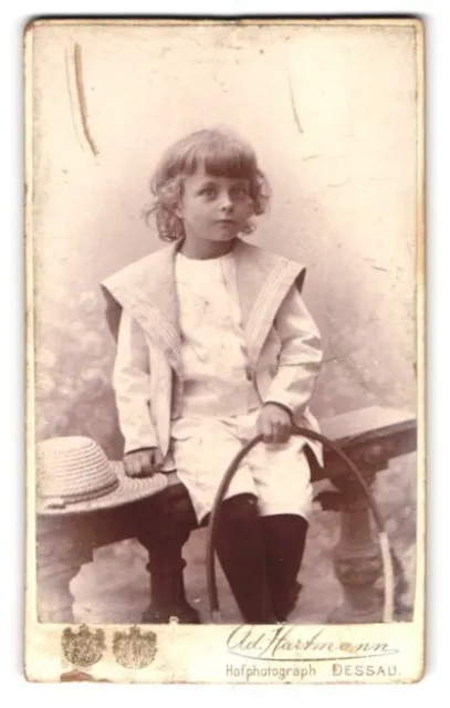 Photographs Ad. Hartmann, Dessau, boy in the twine with hat and ready to play