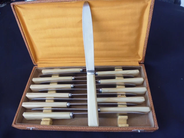 Coffret de 12 couteaux en inox et bakélite Art Déco | Selency