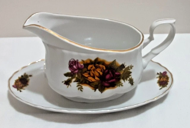 CROWN REGALWHITE FLORAL GRAVY BOAT AND PLATE made in Romania