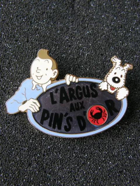 pin's TINTIN L'ARGUS AUX PIN'S D'OR variante 2 - dim : 45x31 mm, hergé , bd