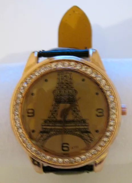 Montre fantaisie femme ou adolescente, cadran décoré tour Eiffel et strass