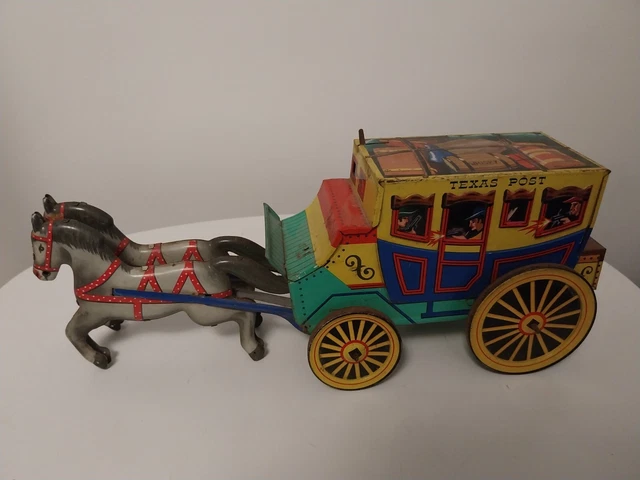 Ancien jouet mécanique cavalier cow-boy cheval tôle lithographiée