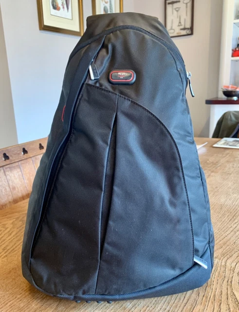 TUMI cross body back pack excellent condition
