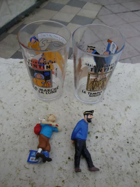 2 figurines TINTIN et HADDOCK +  2 verres  TINTIN 1994  neuf en parfait état !!!