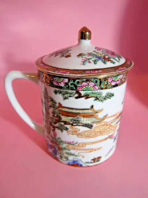 Chinese hand painted  Famille Rose Porcelain tea cup and lid. Delicate & useful.