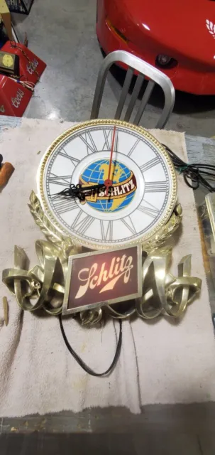 Schlitz Lighted  Clock World Shaped Golden