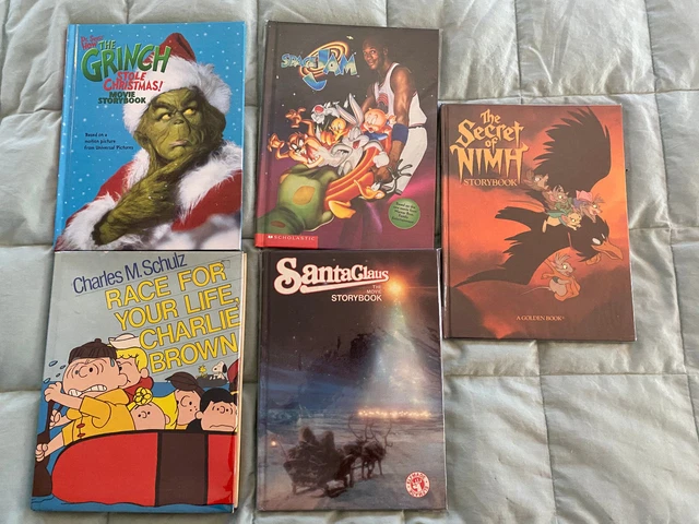 5 juvenile movie tie ins VG Grinch - Space Jam - Charlie Brown - Nimh - Santa