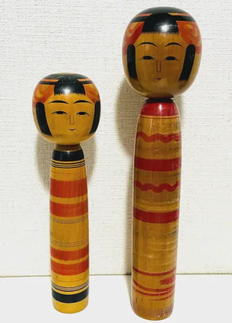 Set of 2 Japanese kokeshi dolls 12 & 10 inches tall signed w/ smile back faces