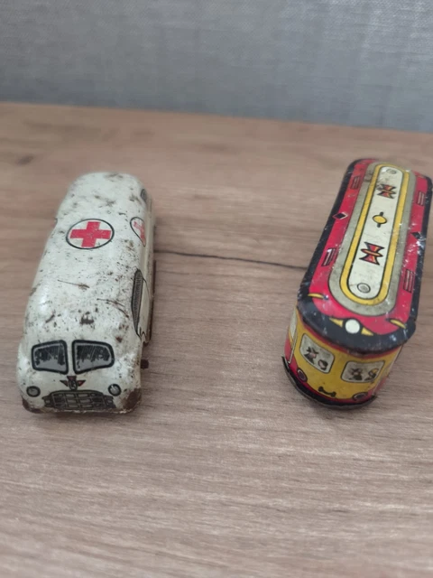 LOT 2 copies de JOUETS anciens en tôles Mécaniques - Jeux & Jouets