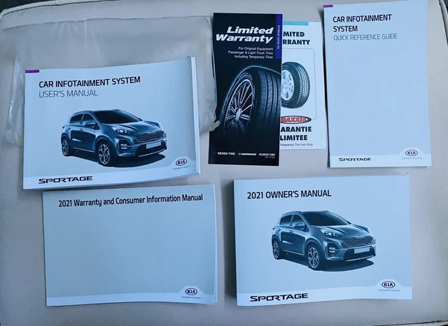 Used (OEM) 2021 KIA sportage  owners manual with guides and plastic Case.