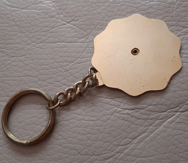 Porte clé doré Cœur Sacré rouge
