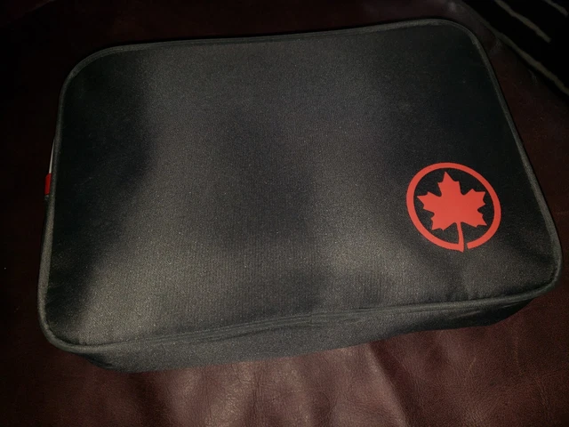 Mint unused Air Canada 1st class red blanket.