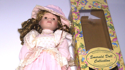 Emerald Doll Collection 15" Porcelain Doll W/ COA Pink hat & dress w/stand.