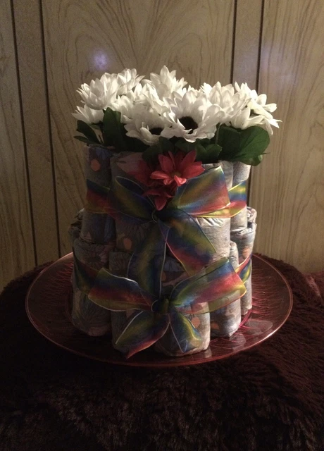 Baby Girl Butterfly Diaper Cake Size 3, 16-28 Lbs, contains 31 diapers.