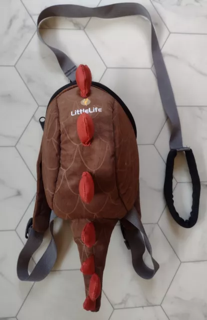 Bolso mochila para niños pequeños Little Life dinosaurio con arnés de riendas de seguridad.