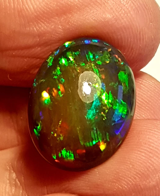 8,60cts RARE grande Opale Noire "pigeon" honey comb, flashs électriques