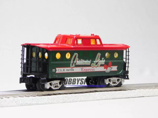 LIONEL CHRISTMAS LIGHT EXPRESS CABOOSE w INTERIOR LIGHTS O GAUGE 2123100-C NEW