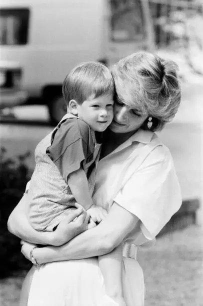 The Princess of Wales holds her young son Prince Harry 1987 Old Photo